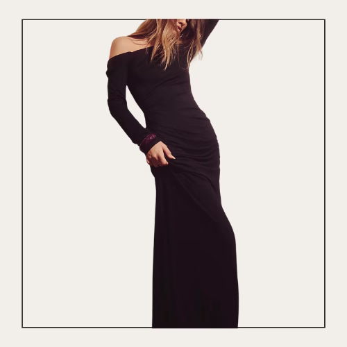 woman wearing an off the shoulder black maxi dress